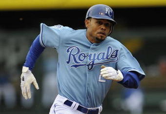 KANSAS CITY, MO - APRIL 30:  Coco Crisp #2 of the Kansas City Royals runs to third base with a triple in the first inning against the Toronto Blue Jays on April 30, 2009 at Kauffman Stadium in Kansas City, Missouri. (Photo by G. Newman Lowrance/Getty Images)