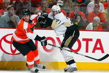 PHILADELPHIA - APRIL 25:  Evgeni Malkin #71 of the Pittsburgh Penguins skates against Mike Richards #18 of the Philadelphia Flyers during Game Six of the Eastern Conference Quarterfinal Round of the 2009 NHL Stanley Cup Playoffs  at the Wachovia Center on April 25, 2009 in Philadelphia, Pennsylvania. The Penguins defeated the Flyers 5-3 to win the series 4 games to 2.  (Photo by Jim McIsaac/Getty Images)