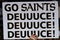 NEW ORLEANS - JANUARY 13:  A fan of the New Orleans Saints holds a sign that reads 'Go Saints Deuuuce!'  against the Philadelphia Eagles during the NFC divisional playoff game at the Superdome on January 13, 2007 in New Orleans, Louisiana.  (Photo by Chris Graythen/Getty Images)