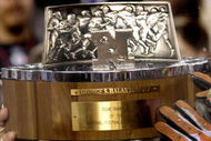 Chicago Bears players stretch for the George Halas trophy  after play against the New Orleans Saints in the NFC Championship game at Soldier Field in Chicago, Illinois on on January 21, 2007.  (Photo by Al Messerschmidt/Getty Images)