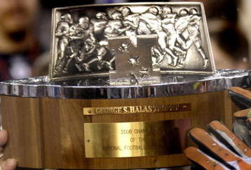 Chicago Bears players stretch for the George Halas trophy  after play against the New Orleans Saints in the NFC Championship game at Soldier Field in Chicago, Illinois on on January 21, 2007.  (Photo by Al Messerschmidt/Getty Images)