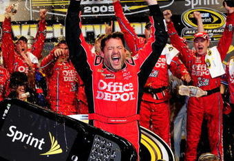 CONCORD, NC - MAY 16:  Tony Stewart, driver of the #14 Office Depot Chevrolet, celebrates in victory lane after winning the NASCAR Sprint All-Star Race on May 16, 2009 at Lowe's Motor Speedway in Concord, North Carolina.  (Photo by Rusty Jarrett/Getty Images for NASCAR)