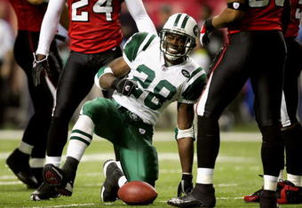 ATLANTA - OCTOBER 24:  Cornerback Curtis Martin #28 of the New York Jets reacts after the play during the game against the Atlanta Falcons on October 24, 2005 at the Georgia Dome in Atlanta, Georgia.  The Atlanta Falcons won 27-14.  (Photo By Streeter Lecka/Getty Images)