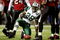 ATLANTA - OCTOBER 24:  Cornerback Curtis Martin #28 of the New York Jets reacts after the play during the game against the Atlanta Falcons on October 24, 2005 at the Georgia Dome in Atlanta, Georgia.  The Atlanta Falcons won 27-14.  (Photo By Streeter Lecka/Getty Images)