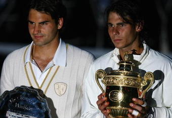 LONDON - JULY 06:  Rafael Nadal of Spain and Roger Federer of Switzerland pose for pictures with after Nadal won in five sets in the final on day thirteen of the Wimbledon Lawn Tennis Championships at the All England Lawn Tennis and Croquet Club on July 6, 2008 in London, England.  (Photo by Julian Finney/Getty Images)