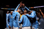 DENVER - MAY 13:  The Denver Nuggets huddle during player introductions before facing the Dallas Mavericks in Game Five of the Western Conference Semifinals during the 2009 NBA Playoffs at Pepsi Center on May 13, 2009 in Denver, Colorado.  The Nuggets defeated the Mavericks 124-110 to advance to the Western Conference Finals.  NOTE TO USER: User expressly acknowledges and agrees that, by downloading and or using this photograph, User is consenting to the terms and conditions of the Getty Images License Agreement.  (Photo by Doug Pensinger/Getty Images)
