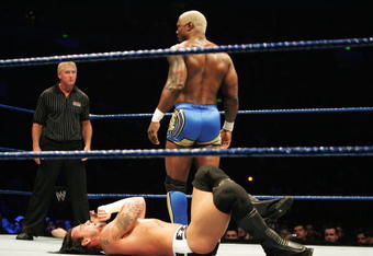 SYDNEY, AUSTRALIA - JUNE 15:  Shelton Benjamin stands over CM Punk during WWE Smackdown at Acer Arena on June 15, 2008 in Sydney, Australia.  (Photo by Gaye Gerard/Getty Images)