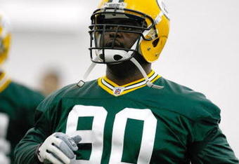 GREEN BAY, WI - MAY 1:  Defensive lineman B.J. Raji #90 runs as he participates in practice drills during Green Bay Packers Minicamp at Don Hutson Center on May 1, 2009 in Green Bay, Wisconsin. (Photo by Scott Boehm/Getty Images)