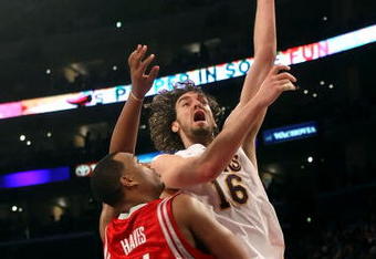 LOS ANGELES, CA - MAY 17:  Pau Gasol #16 of the Los Angeles Lakers shoots over Chuck Hayes #44 of the Houston Rockets in the first half of Game Seven of the Western Conference Semifinals during the 2009 NBA Playoffs at Staples Center on May 17, 2009 in Los Angeles, California. NOTE TO USER: User expressly acknowledges and agrees that, by downloading and or using this photograph, User is consenting to the terms and conditions of the Getty Images License Agreement.  (Photo by Stephen Dunn/Getty Images)