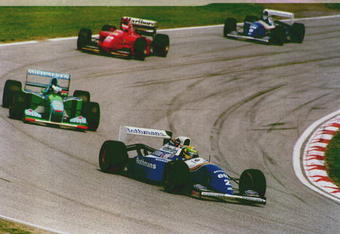 1 MAY 1994:  AYRTON SENNA OF BRAZIL LEADS THE FIELD INTO A CORNER AFTER THE START OF THE SAN MARINO FORMULA ONE GRAND PRIX IN IMOLA. SENNA LATER CRASHED HIS ROTHMANS WILLIAMS CAR INTO THE CONCRETE BARRIER AND SUSTAINED SERIOUS HEAD INJURIES IN THE ACCIDENT. HOSPITAL STAFF HAVE PRONOUNCED HIM DEAD. Mandatory Credit: Anton Want/ALLSPORT