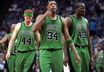 ORLANDO, FL - MAY 08:  Paul Pierce #34, Brian Scalabrine#44 and Kendrick Perkins #43 of the Boston Celtics walk onto the court against the Orlando Magic in Game Three of the Eastern Conference Semifinals during the 2009 NBA Playoffs at Amway Arena on May 8, 2009 in Orlando, Florida. NOTE TO USER: User expressly acknowledges and agrees that, by downloading and or using this photograph, User is consenting to the terms and conditions of the Getty Images License Agreement.  (Photo by Marc Serota/Getty Images)
