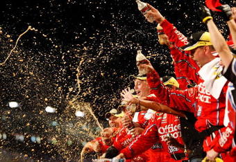 CONCORD, NC - MAY 16:  The Office Depot/Old Spice team celebrates after winning the NASCAR Sprint All-Star Race on May 16, 2009 at Lowe's Motor Speedway in Concord, North Carolina.  (Photo by Chris Graythen/Getty Images)