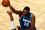 NEW ORLEANS - FEBRUARY 08:  Al Jefferson #25 of the Minnesota Timberwolves makes a shot over David West #30 of the New Orleans Hornets on February 8, 2009 in New Orleans, Louisiana.  The Hornets defeated the Timberwolves 101-97.  NOTE TO USER: User expressly acknowledges and agrees that, by downloading and/or using this Photograph, user is consenting to the terms and conditions of the Getty Images License Agreement.  (Photo by Chris Graythen/Getty Images)