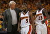 OAKLAND, CA - MAY 11:  Baron Davis #5 of the Golden State Warriors is congratulated by Head Coach Don Nelson and Jason Richardson #23 after defeating the Utah Jazz in Game Three of the Western Conference Semifinals during the 2007 NBA Playoffs at Oracle Arena May 11, 2007 in Oakland, California. The Warriors defeated the Jazz 125-105. NOTE TO USER: User expressly acknowledges and agrees that, by downloading and or using this photograph, user is consenting to the terms and conditions of the Getty Images License Agreement.  (Photo by Justin Sullivan/Getty Images)