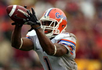TALLAHASSEE, FL - NOVEMBER 29:  Receiver Percy Harvin #1 of the Florida Gators takes a direct snap and runs for a touchdown  against the Florida State Seminoles at Bobby Bowden Field at Doak Campbell Stadium on November 29, 2008 in Tallahassee, Florida.  The Gators defeated the Seminoles 45-15.  (Photo by Marc Serota/Getty Images)