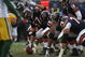 CHICAGO - DECEMBER 23: Olin Kruetz #57 of the Chicago Bears readies to make the snap against the Green Bay Packers on December 23, 2007 at Soldier Field in Chicago, Illinois. (Photo by Jonathan Daniel/Getty Images)