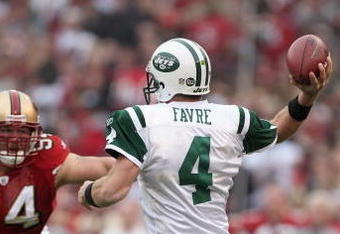 SAN FRANCISCO - DECEMBER 07:  Quarterback Brett Favre #4 of the New York Jets passes the ball against the San Francisco 49ers during an NFL game on December 7, 2008 at Candlestick Park in San Francisco, California. (Photo by Jed Jacobsohn/Getty Images)
