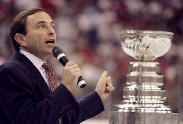 16 Jun 1998: NHL Commisioner Gary Bettman talks and points to the Stanley Cup Trophy during the Stanley Cup Finals game between the Detroit Red Wings and the Washington Capitals at the MCI Center in Washington, D. C.. The Red Wings defeated the Capitals 4-1.