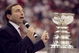 16 Jun 1998: NHL Commisioner Gary Bettman talks and points to the Stanley Cup Trophy during the Stanley Cup Finals game between the Detroit Red Wings and the Washington Capitals at the MCI Center in Washington, D. C.. The Red Wings defeated the Capitals 4-1.