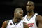 CHARLOTTE, NC - MARCH 13:  Raymond Felton #20 and teammate Emeka Okafor #50 of the Charlotte Bobcats react during their game against the Houston Rockets at Time Warner Cable Arena on March 13, 2009 in Charlotte, North Carolina. NOTE TO USER: User expressly acknowledges and agrees that, by downloading and/or using this Photograph, user is consenting to the terms and conditions of the Getty Images License Agreement.  (Photo by Streeter Lecka/Getty Images)