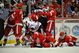DETROIT - MAY 17:  Officials attempt to seperate players from the Detroit Red Wings and the Chicago Blackhawks as they tussel in front of the Red WIngs net during Game One of the Western Conference Championship Round of the 2009 Stanley Cup Playoffs on May 17, 2009 at Joe Louis Arena in Detroit, Michigan.  (Photo by Jamie Sabau/Getty Images)