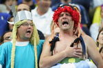 SAINT-DENIS, FRANCE - SEPTEMBER 07:  FFrench fans dressed as cartoon characters 'Asterix and Obelix' cheer on their team during the opening match of the Rugby World Cup 2007 between France and Argentina at the Stade de France on September 7, 2007 in Saint-Denis, France.  (Photo by Laurence Griffiths/Getty Images)