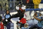 NASHVILLE, TN - JANUARY 10:  Wide receiver Mark Clayton #89 of the Baltimore Ravens catches a 37-yard pass between Cortland Finnegan #31 and Chris Hope #24 of the Tennessee Titans in the third quarter during the AFC Divisional Playoff Game on January 10, 2009 at LP Field in Nashville, Tennessee.  (Photo by Jonathan Daniel/Getty Images)