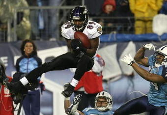 NASHVILLE, TN - JANUARY 10:  Wide receiver Mark Clayton #89 of the Baltimore Ravens catches a 37-yard pass between Cortland Finnegan #31 and Chris Hope #24 of the Tennessee Titans in the third quarter during the AFC Divisional Playoff Game on January 10, 2009 at LP Field in Nashville, Tennessee.  (Photo by Jonathan Daniel/Getty Images)