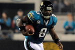 JACKSONVILLE, FL - DECEMBER 18: David Garrard #9 of the Jacksonville Jaguars runs for yardage during the game against the Indianapolis Colts at Jacksonville Municipal Stadium on December 18, 2008 in Jacksonville, Florida.  (Photo by Sam Greenwood/Getty Images)