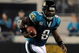 JACKSONVILLE, FL - DECEMBER 18: David Garrard #9 of the Jacksonville Jaguars runs for yardage during the game against the Indianapolis Colts at Jacksonville Municipal Stadium on December 18, 2008 in Jacksonville, Florida.  (Photo by Sam Greenwood/Getty Images)