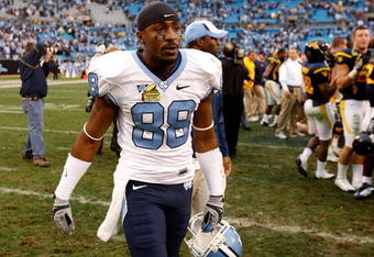 CHARLOTTE, NC - DECEMBER 27:  Hakeem Nicks #88 of the North Carolina Tar Heels walks off the field after a 31-30 defeat to the West Virginia Mountaineers during the Meineke Car Care Bowl on December 27, 2008 at Bank of America Stadium in Charlotte, North Carolina.  (Photo by Streeter Lecka/Getty Images)