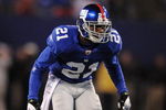 EAST RUTHERFORD, NJ - NOVEMBER 02: Kenny Phillips #21 of the New York Giants in action against the Dallas Cowboys during their game on November 2, 2008 at Giants Stadium in East Rutherford, New Jersey.  (Photo by Al Bello/Getty Images)