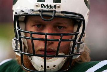 EAST RUTHERFORD, NJ - NOVEMBER 26:  Nick Mangold #74 of the New York Jets looks on against the Houston Texans at Giants Stadium on November 26, 2006 in East Rutherford, New Jersey.  (Photo by Chris McGrath/Getty Images)