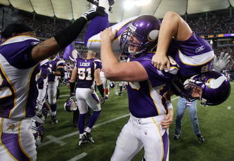 MINNEAPOLIS - DECEMBER 28:   Ryan Longwell #8 of the Minnesota Vikings is carried by Cullen Loeffler #46 after Longwell kicked the game winning field goal with five seconds left in the game against the New York Giants on December 28,2008 at the Hubert H. Humphrey Metrodome in Minneapolis, Minnesota. The Vikings defeated the Giants 20-19.  (Photo by Elsa/Getty Images)