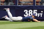 NEW YORK - APRIL 19:  Grady Sizemore #24 of the Cleveland Indians dives for a ball hit by Derek Jeter #2 of the New York Yankees at Yankee Stadium on April 19, 2009 in the Bronx borough of New York City.  (Photo by Ezra Shaw/Getty Images)