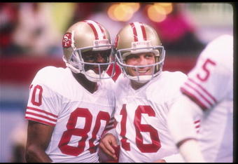 28 Jan 1990:  San Francisco 49ers quarterback Joe Montana (right) and wide receiver Jerry Rice celebrate during Super Bowl XXIV against the Denver Broncos at the Superdome in New Orleans, Louisiana.  The 49ers won the game, 55-10. Mandatory Credit: Rick S