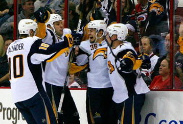 RALEIGH, NC - FEBRUARY 26:  Patrick Kaleta #36 of the Buffalo Sabres celebrates with teammates after scoring a goal against the Carolina Hurricanes during the game on February 26, 2009 at RBC Center in Raleigh, North Carolina.  (Photo by Kevin C. Cox/Getty Images)