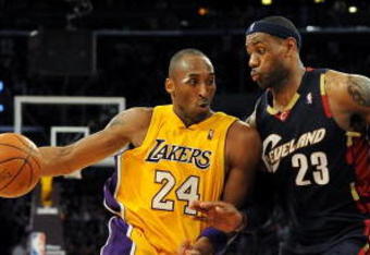LOS ANGELES, CA - JANUARY 19:  Kobe Bryant #24 of the Los Angeles Lakers drives the ball against LeBron James #23 of the Cleveland Cavaliers during the forth quarter at Staples Center on January 19, 2009 in Los Angeles, California.  (Photo by Harry How/Getty Images)