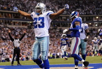 IRVING, TX - DECEMBER 14:  Running back Tashard Choice #23 of the Dallas Cowboys celebrates his touchdown against the New York Giants in the fourth quarter at Texas Stadium on December 14, 2008 in Irving, Texas.  (Photo by Ronald Martinez/Getty Images)