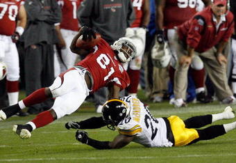 TAMPA, FL - FEBRUARY 01:  Wide receiver Anquan Boldin #81 of the Arizona Cardinals makes a reception against Bryant McFadden #20 of the Pittsburgh Steelers during Super Bowl XLIII on February 1, 2009 at Raymond James Stadium in Tampa, Florida.  (Photo by Kevin C. Cox/Getty Images)