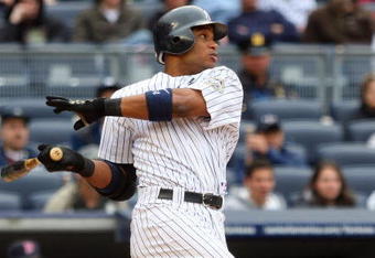 NEW YORK - MAY 17:  Robinson Cano #24 of the New York Yankees bats against the Minnesota Twins on May 17, 2009 at Yankee Stadium in the Bronx borough of New York City. The Yankees defeated the Twins 3-2 in ten innings.  (Photo by Jim McIsaac/Getty Images)
