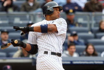 NEW YORK - MAY 17:  Robinson Cano #24 of the New York Yankees bats against the Minnesota Twins on May 17, 2009 at Yankee Stadium in the Bronx borough of New York City. The Yankees defeated the Twins 3-2 in ten innings.  (Photo by Jim McIsaac/Getty Images)