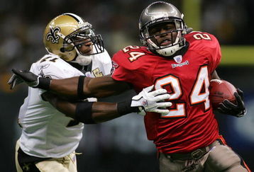 NEW ORLEANS - OCTOBER 8:  Running back Cadillac Williams #24 of the Tampa Bay Buccaneers runs the ball against Roman Harper #41 of the New Orleans Saints at the Louisiana Superdome on October 8, 2006 in New Orleans, Louisiana.  (Photo by Ronald Martinez/Getty Images)