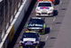 MARTINSVILLE, VA - MARCH 29: Scott Speed, driver of the #82 Red Bull Toyota, races along side Dale Earnhardt Jr., driver of the #88 National Guard/AMP Energy Chevrolet, during the NASCAR Sprint Cup Series Goody's Fast Pain Relief 500 at the Martinsville Speedway on March 29, 2009 in Martinsville, Virginia. (Photo by John Harrelson/Getty Images)