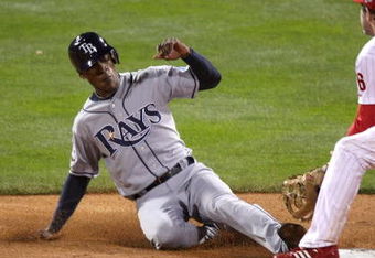 PHILADELPHIA - OCTOBER 25:  Chase Utley #26 of the Philadelphia Phillies cannot get the tage down as BJ Upton #2 of the Tampa Bay Rays steals second during game three of the 2008 MLB World Series on October 25, 2008 at Citizens Bank Park in Philadelphia, Pennsylvania.  (Photo by Jed Jacobsohn/Getty Images)