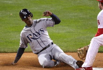 PHILADELPHIA - OCTOBER 25:  Chase Utley #26 of the Philadelphia Phillies cannot get the tage down as BJ Upton #2 of the Tampa Bay Rays steals second during game three of the 2008 MLB World Series on October 25, 2008 at Citizens Bank Park in Philadelphia, Pennsylvania.  (Photo by Jed Jacobsohn/Getty Images)