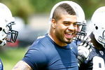SAN DIEGO - MAY 03: Linebacker Shawne Merriman #56 of the San Diego Chargers watches practice during minicamp at the team's training facility on May 3, 2009 in San Diego, California. Merriman did not participate in any of the drills. (Photo by Kevin Terrell/Getty Images)