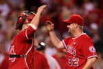 ANAHEIM, CA - MAY 13:  Pitcher Matt Palmer #32 of the Los Angeles Angels of Anaheim is congratulated by catcher Mike Napoli #44 after picking up his first major league complete game victory, against the Boston Red Sox on May 13, 2009 at Angel Stadium in Anaheim, California.  The Angels won 8-4.  (Photo by Stephen Dunn/Getty Images)