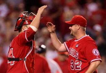 ANAHEIM, CA - MAY 13:  Pitcher Matt Palmer #32 of the Los Angeles Angels of Anaheim is congratulated by catcher Mike Napoli #44 after picking up his first major league complete game victory, against the Boston Red Sox on May 13, 2009 at Angel Stadium in Anaheim, California.  The Angels won 8-4.  (Photo by Stephen Dunn/Getty Images)