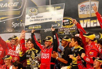 CONCORD, NC - MAY 16:  Tony Stewart, driver of the #14 Office Depot Chevrolet, celebrates in victory lane after winning the NASCAR Sprint All-Star Race on May 16, 2009 at Lowe's Motor Speedway in Concord, North Carolina.  (Photo by Geoff Burke/Getty Images for NASCAR)